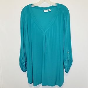 Kim Roger's Teal Blouse